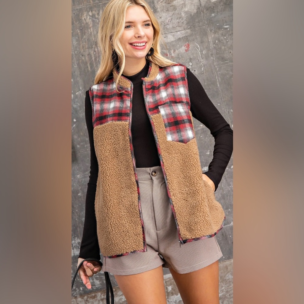Add a layer of style to any look with this fluffy fur plaid mixed vest!